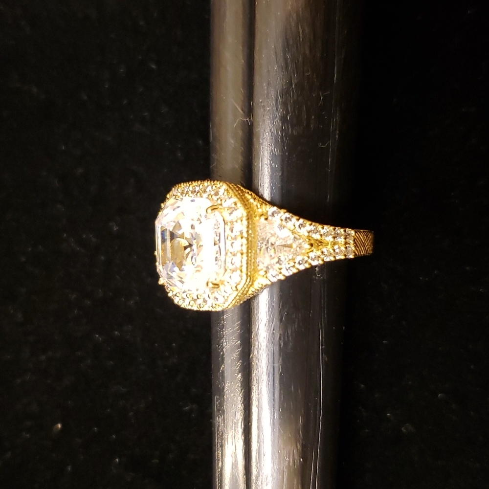 Judith Ripka 14 K clad silver ring with huge Asscher cut center stone